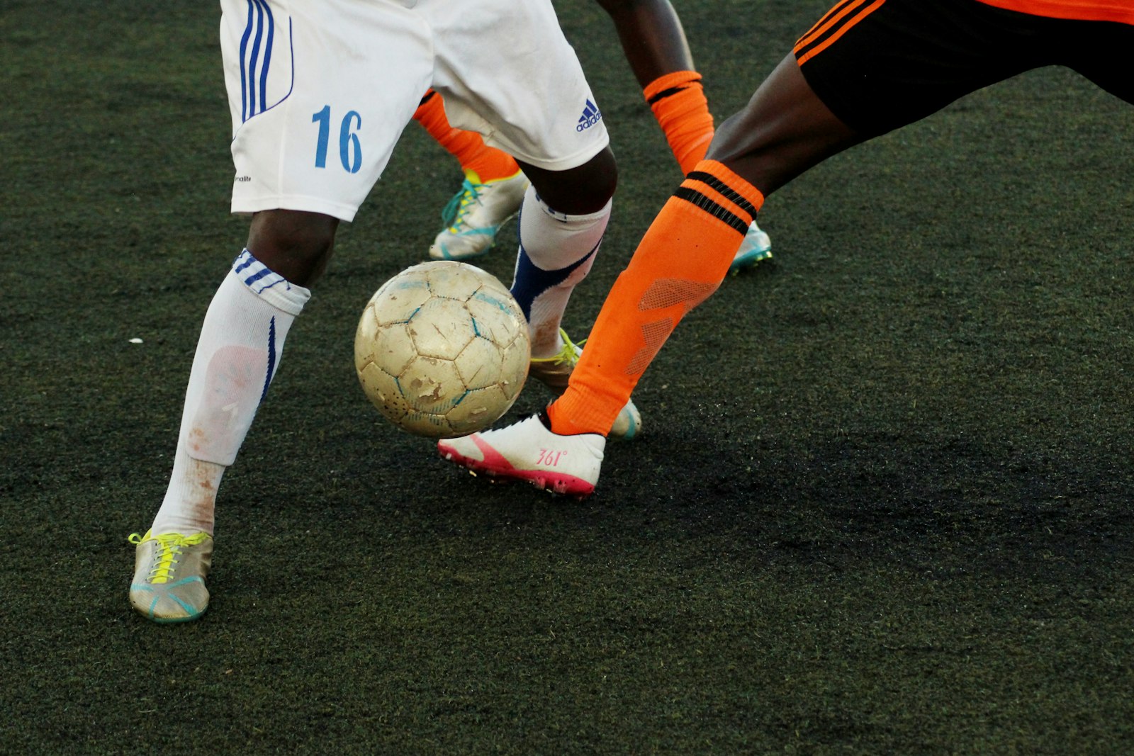 Grassroots youth football players during a match
